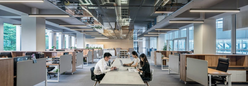 Top 5 Enterprise Trends 2026 - A smart office environment with workers