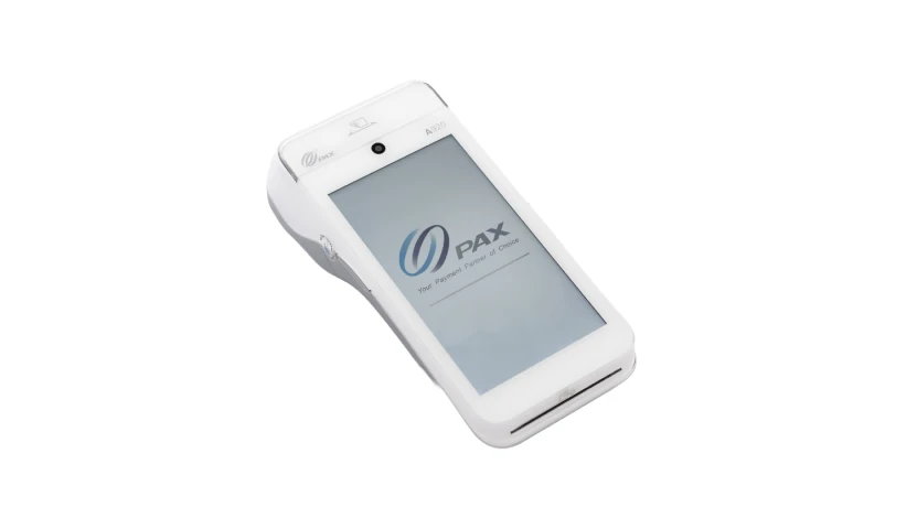 White handheld payment retail terminal with "PAX" logo on screen, featuring buttons and card slot. Illustrating 1GLOBAL cellular modules available for retail and POS.