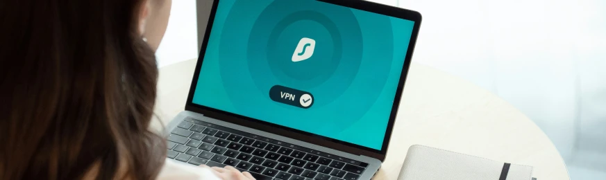 Connectivity Data - a woman using a VPN on her laptop