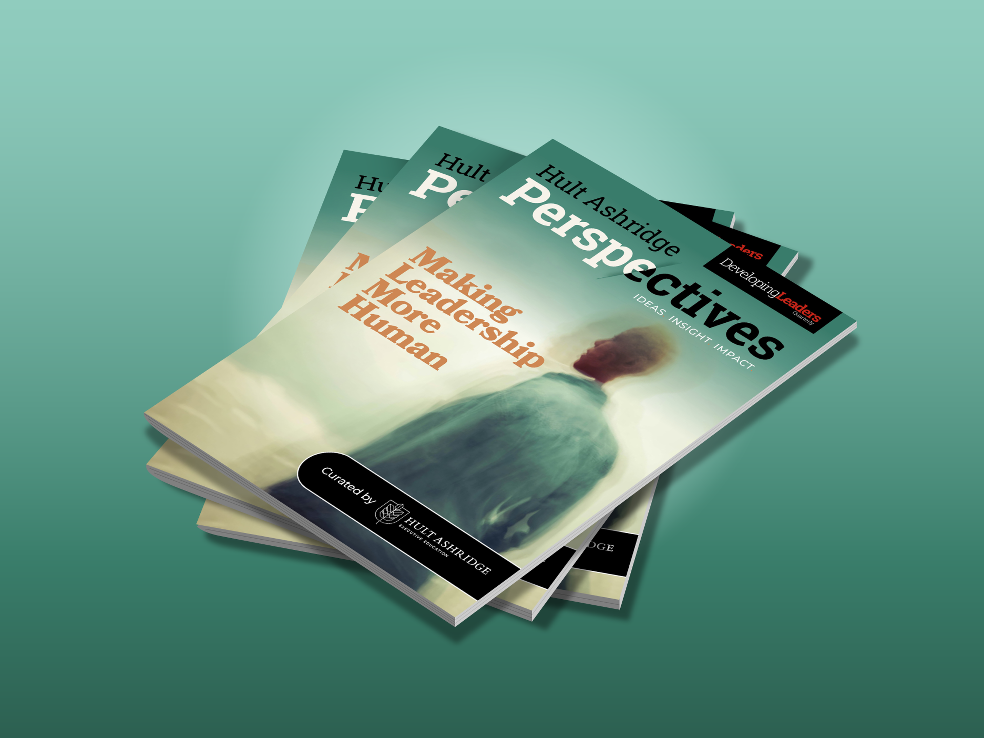 Stack of "Hult Ashridge Perspectives" magazines with the cover text "Making Leadership More Human" on a teal background.