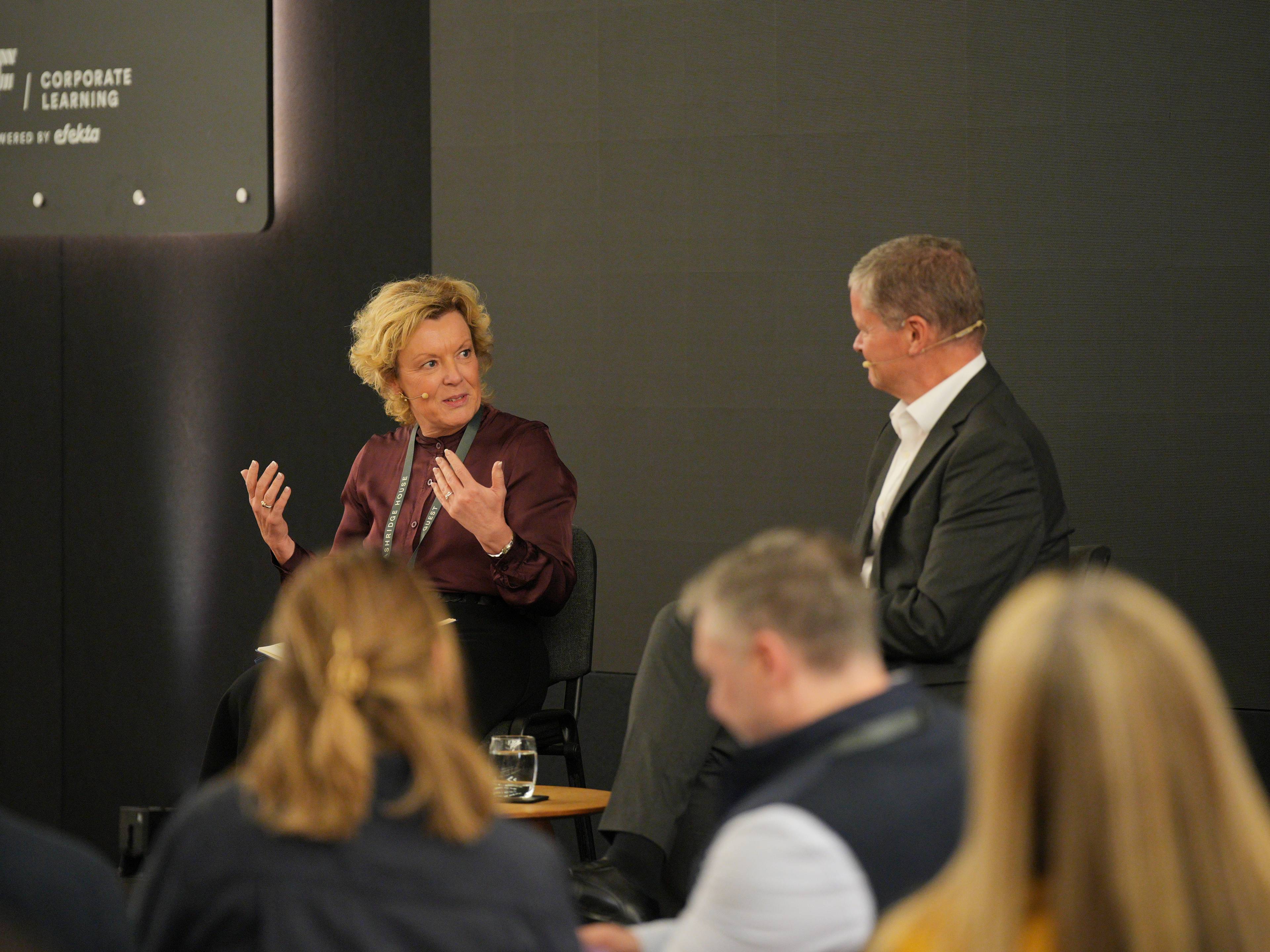 Cecelia Sandberg and Chris McCormick on stage at Summit