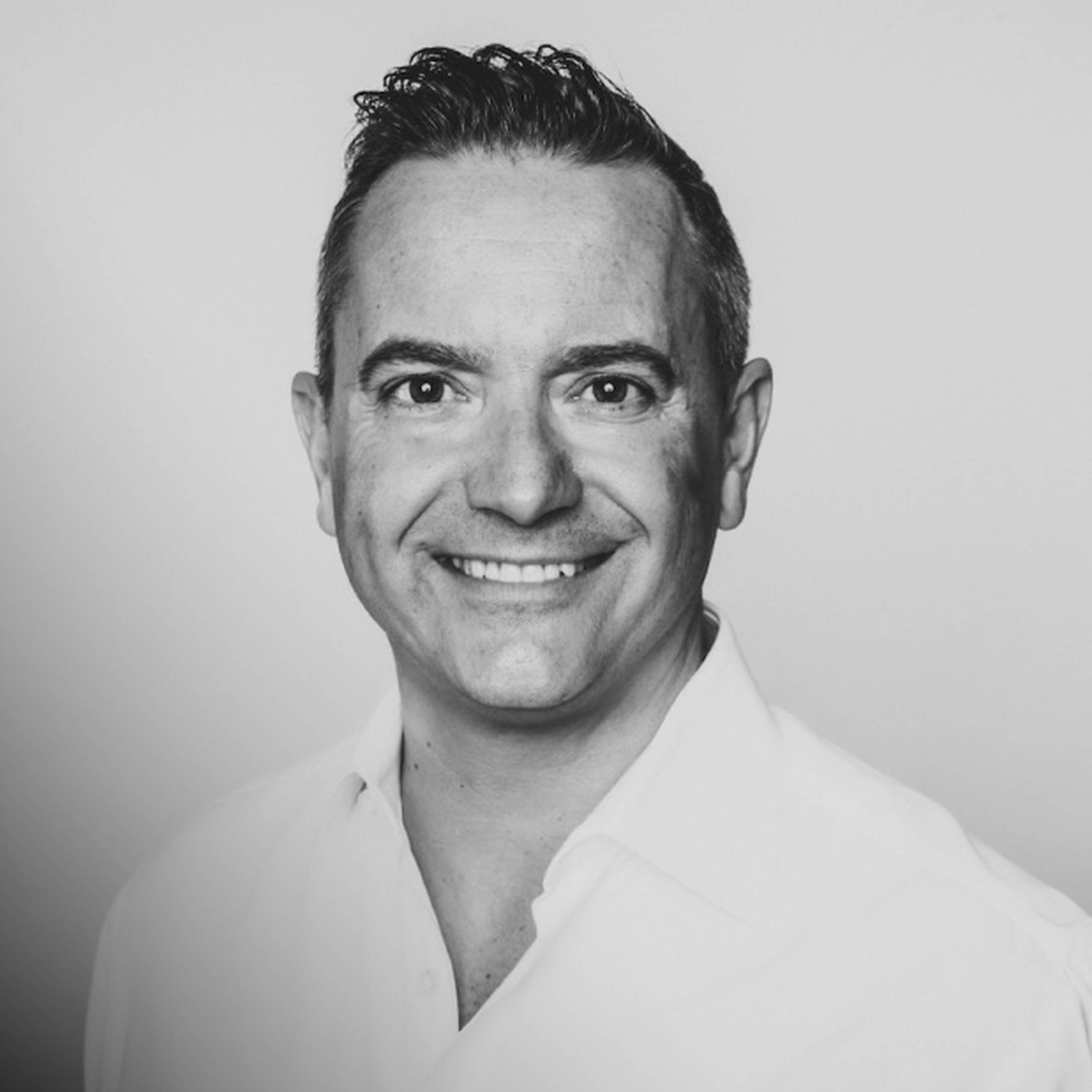 Headshot of Chris Samsa in black and white