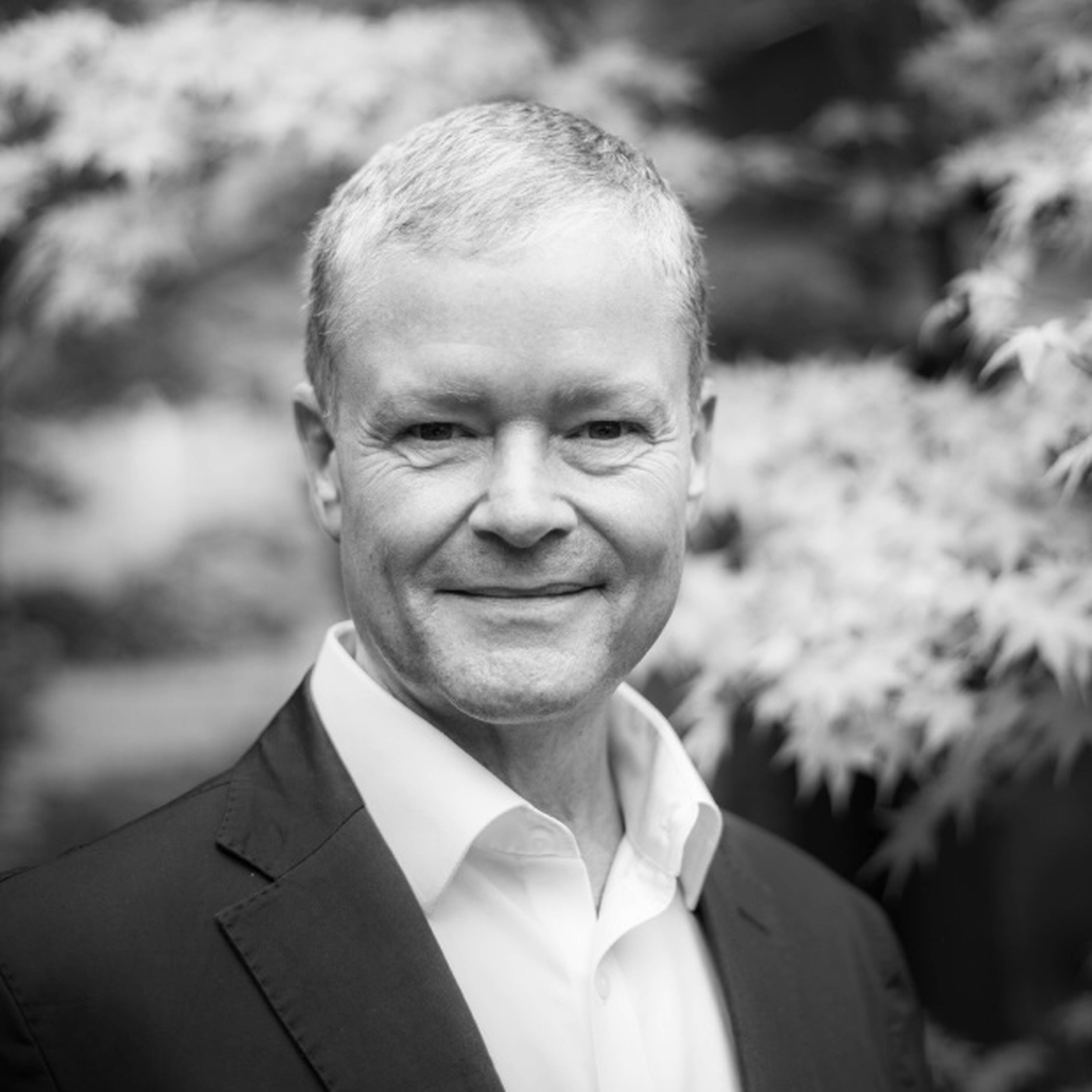 Headshot of Dr Christopher McCormick in black and white