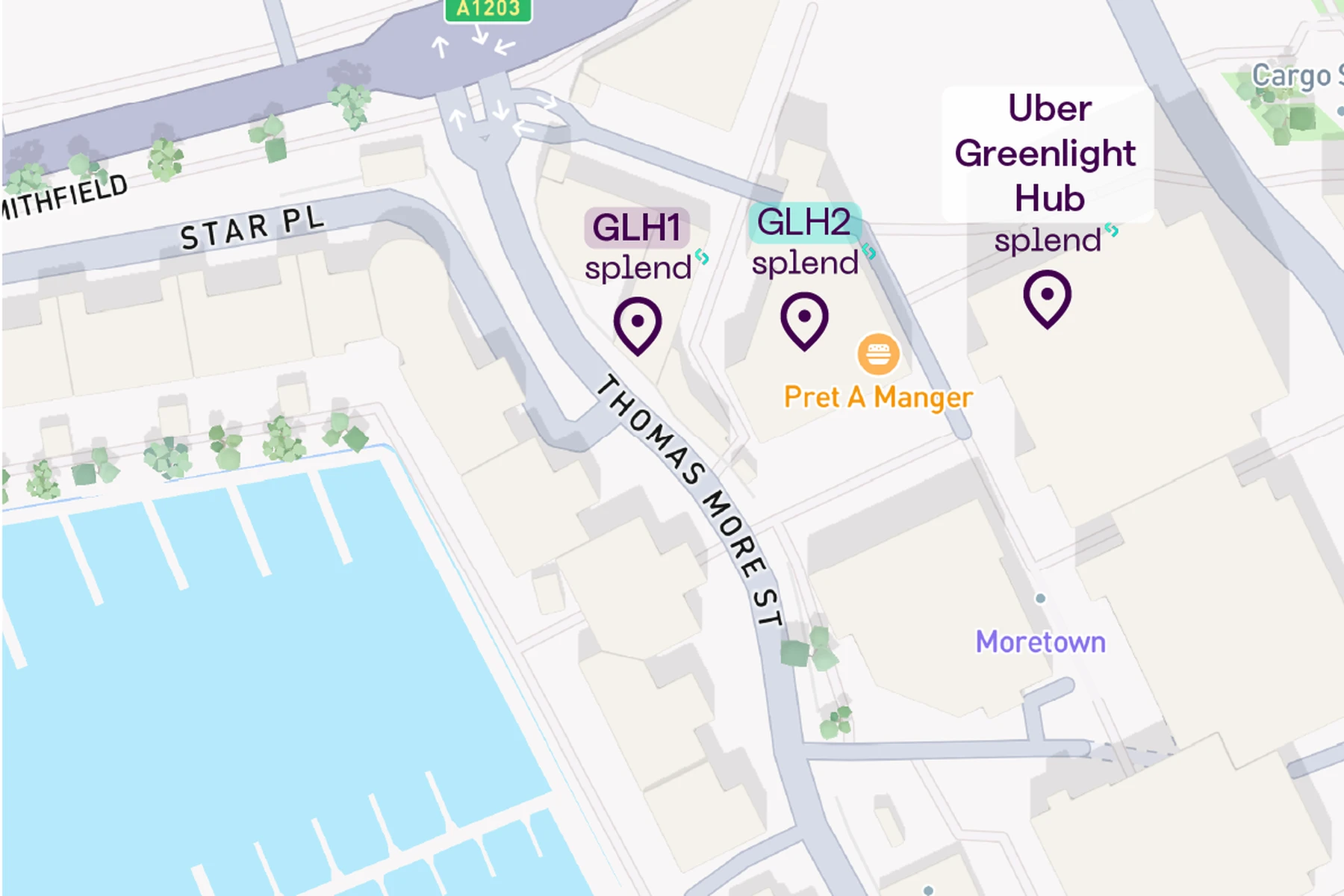 Map excerpt of a marina area showing Thomas More St and Star Pl, GLH1/GLH2 and Uber Greenlight Hub markers, Pret A Manger and waterfront docks.