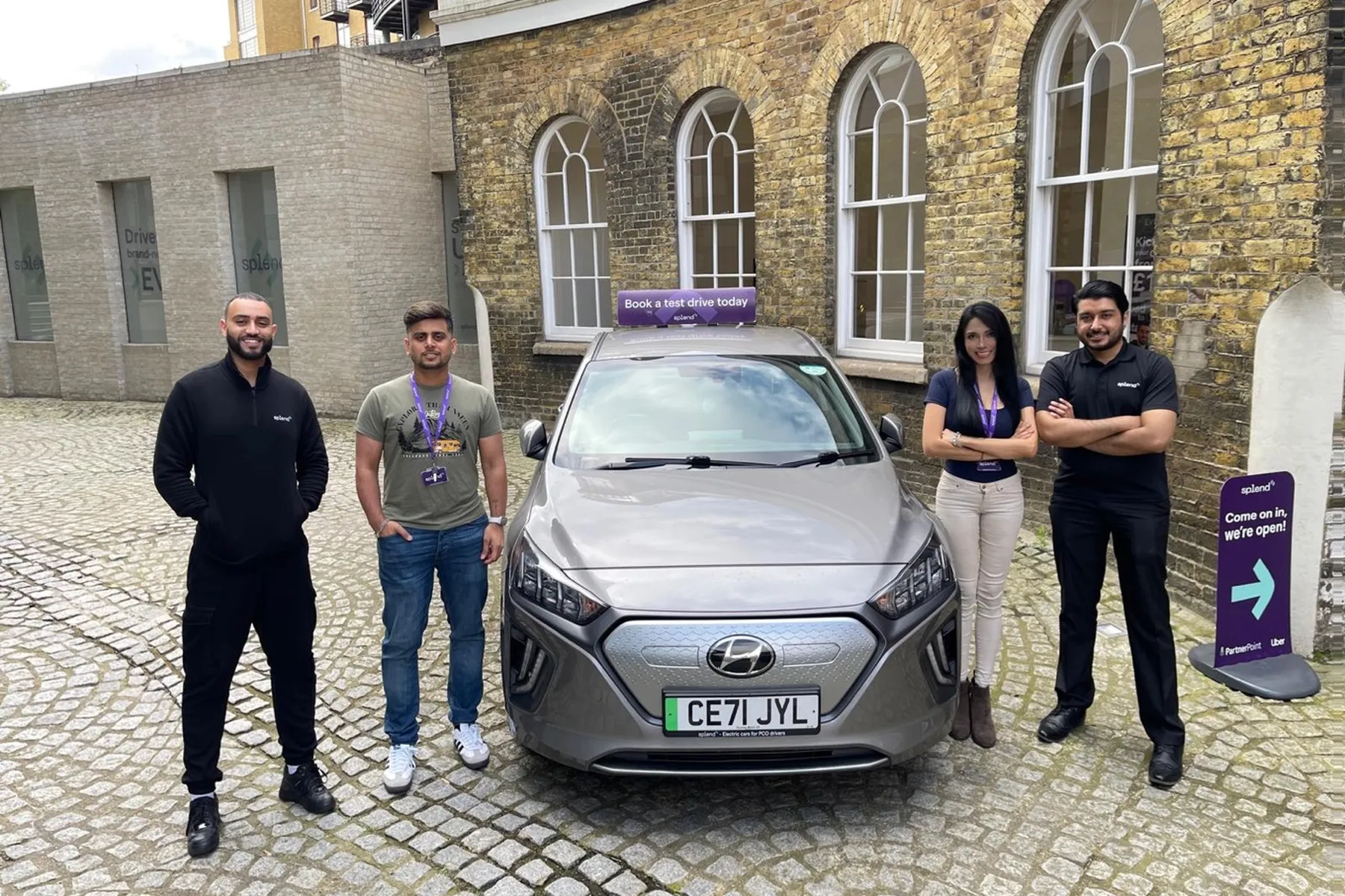 Splend team members with Electric Vehicle at Uber Greenlight Hub London