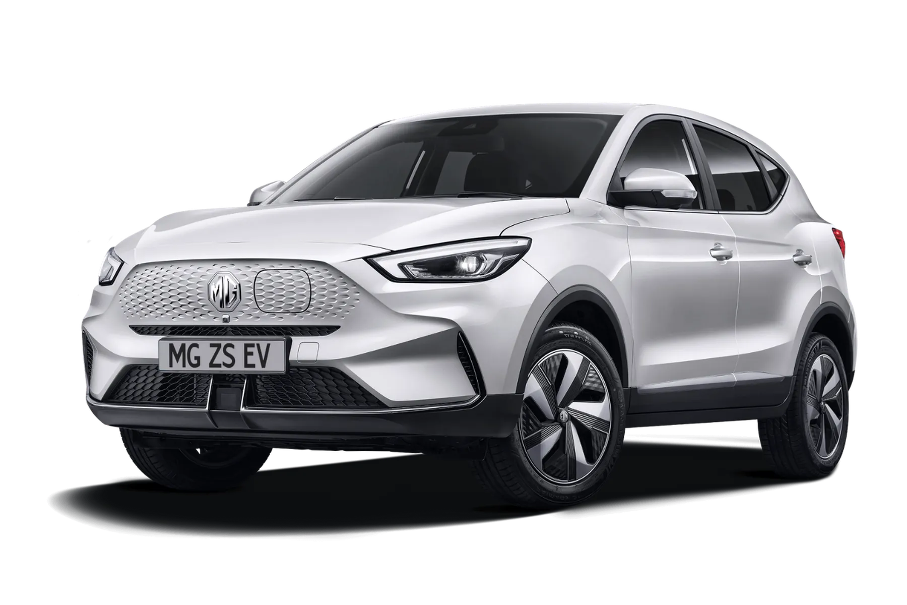 White MG ZS EV electric SUV with sleek design, distinctive front grille, and modern alloy wheels, shown against a plain background.