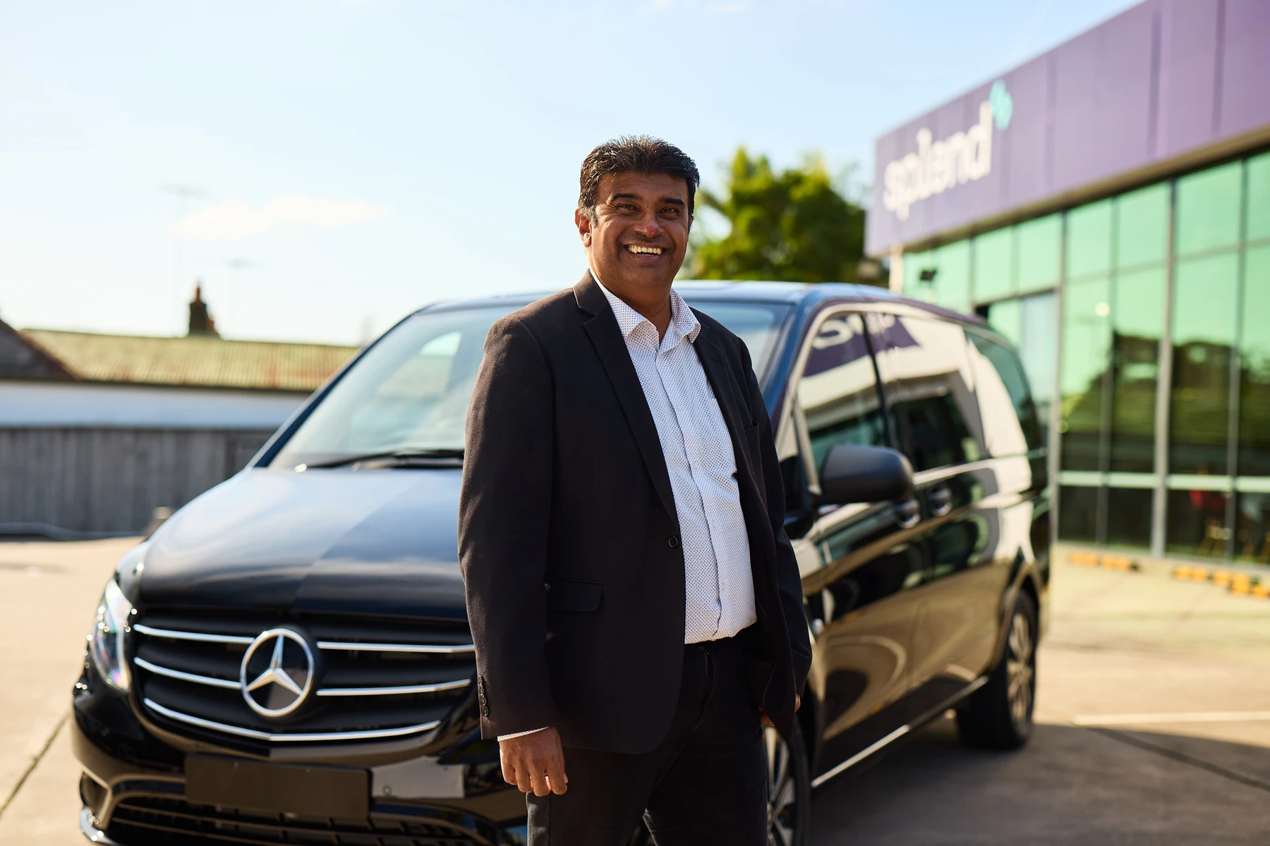 Uber driver with his Mercedes vehicle at Splend Hub