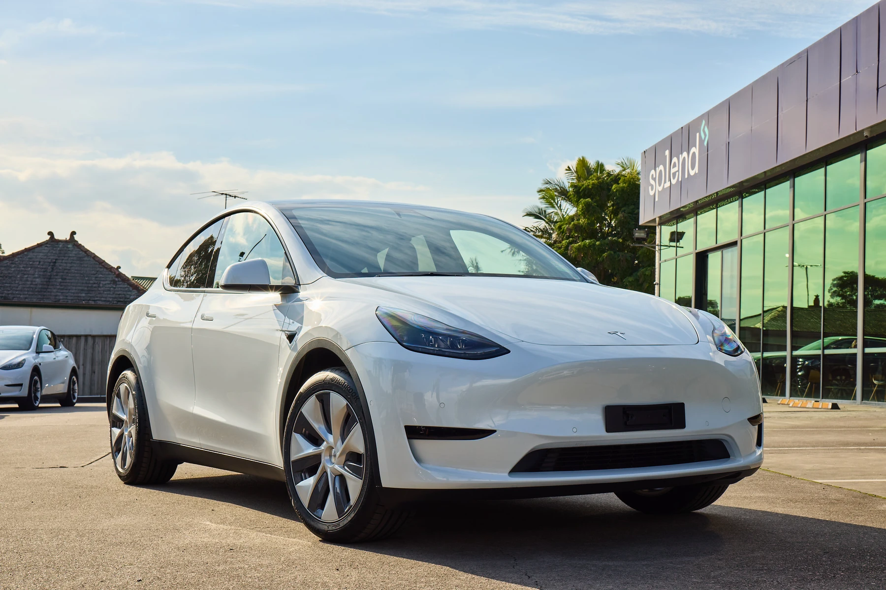 White Tesla Model Y at Splend hub