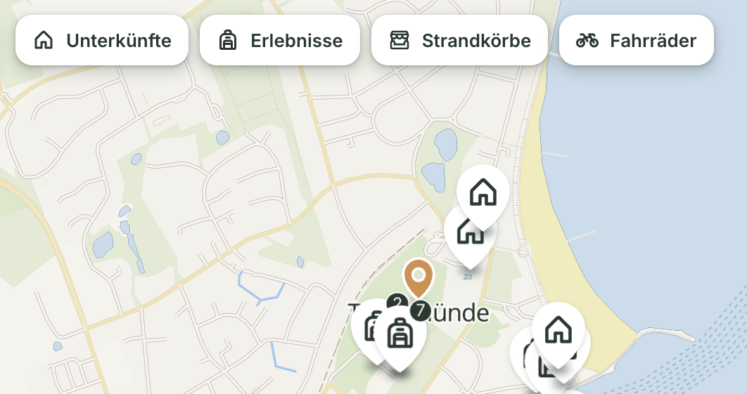 Auf der illustrierten Karte von Travemünde werden Karte und Erlebnisse angezeigt