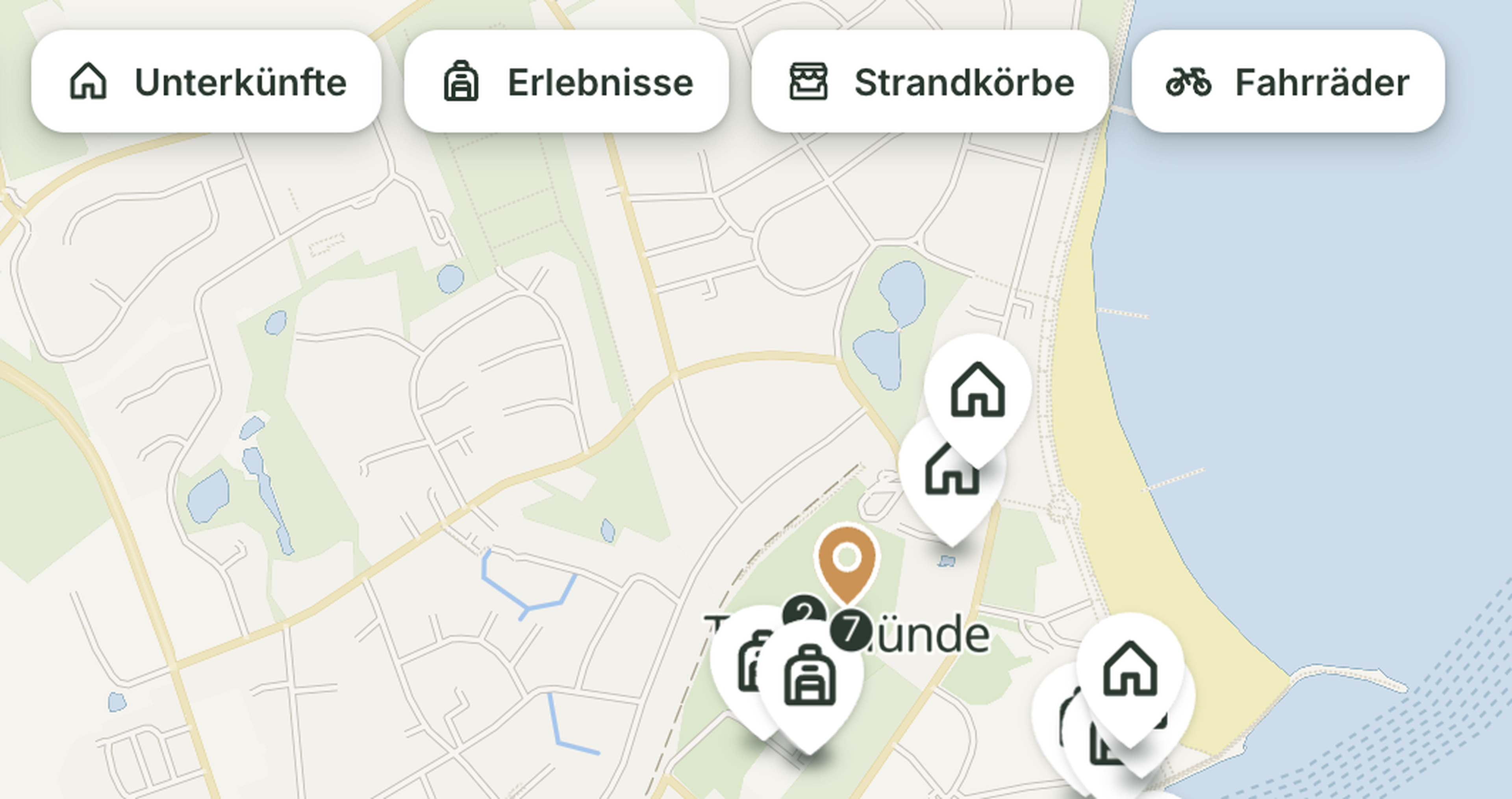 Auf der illustrierten Karte von Travemünde werden Karte und Erlebnisse angezeigt