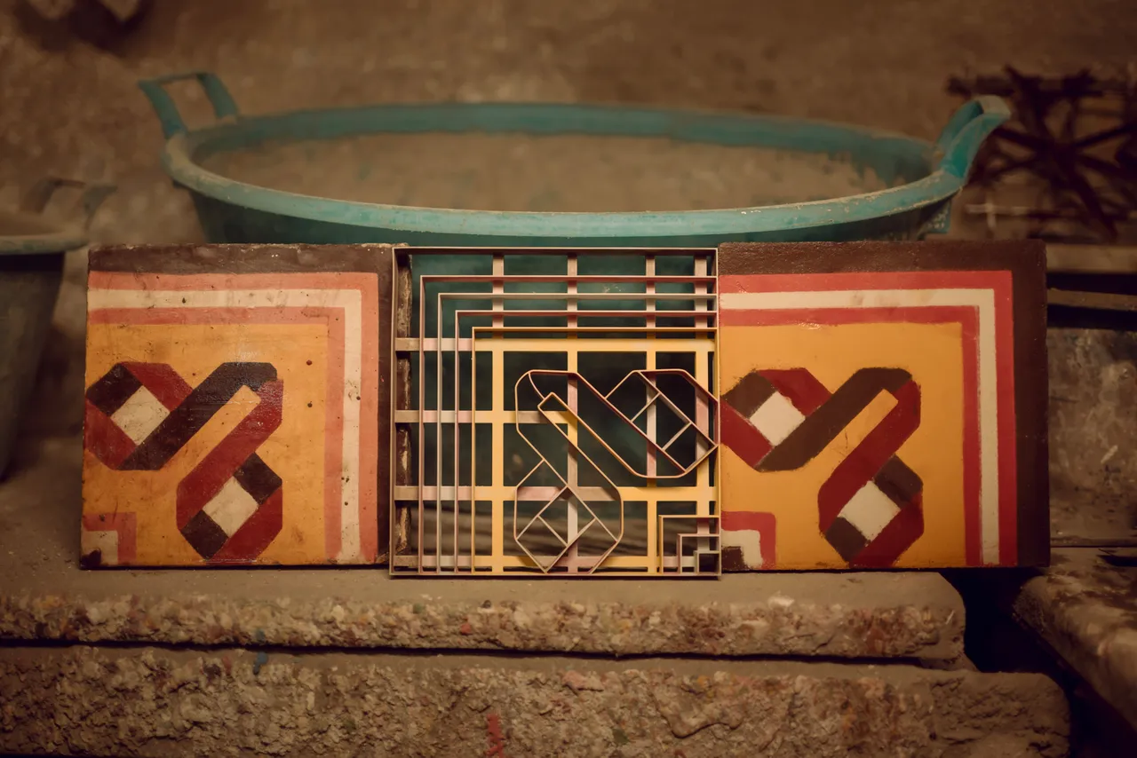 A replicated heritage tile matched to an original Maltese pattern