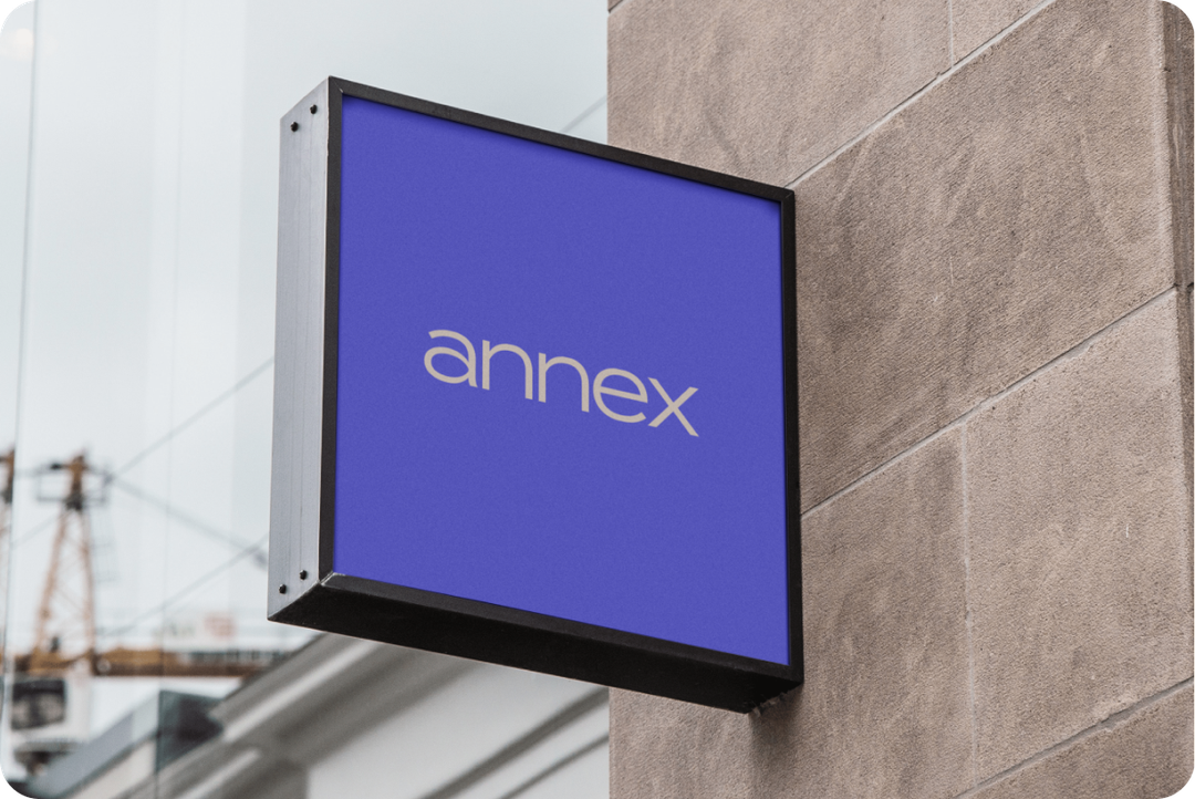Photo showing Annex branded sign on a wall