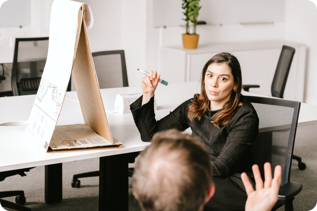 Second photo of Studio East employees in a meeting