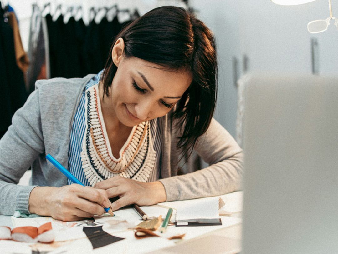 a woman sketching a visual concept