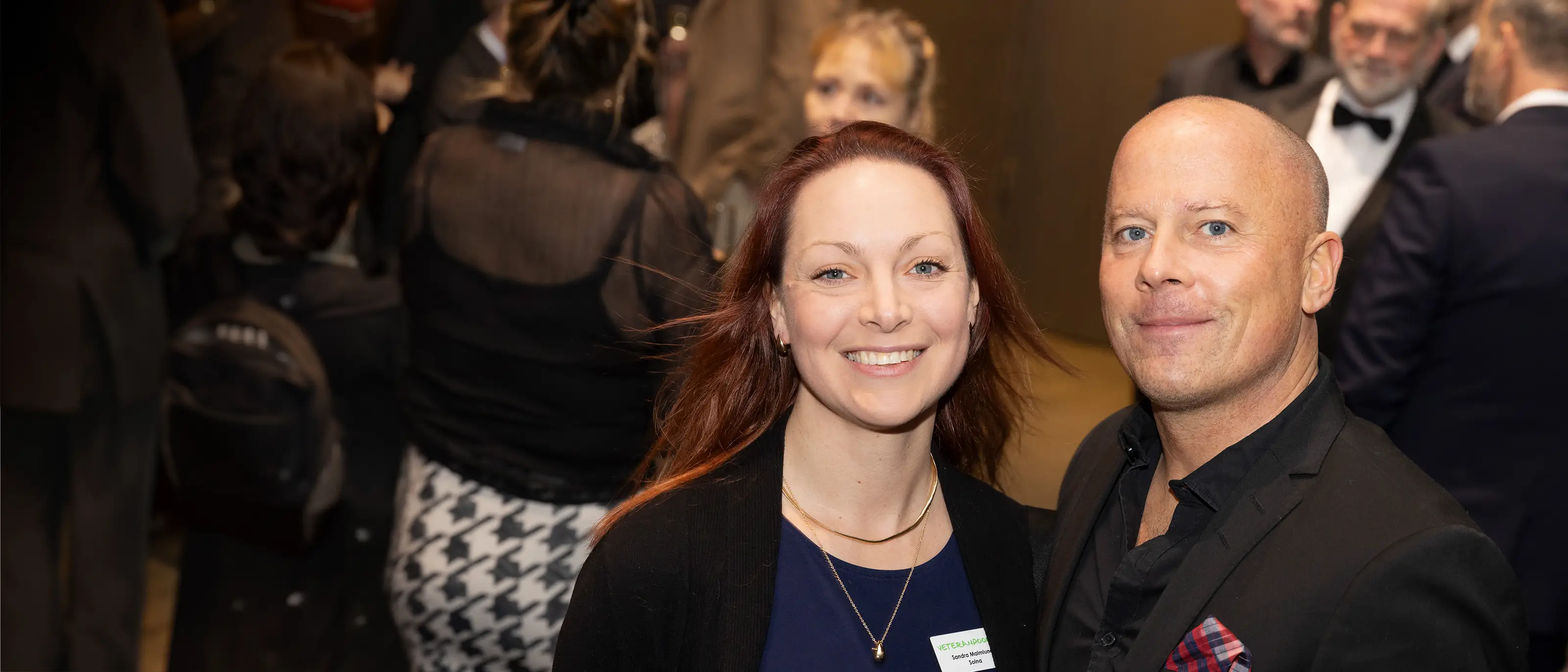 Två glada franchisetagare på konferens