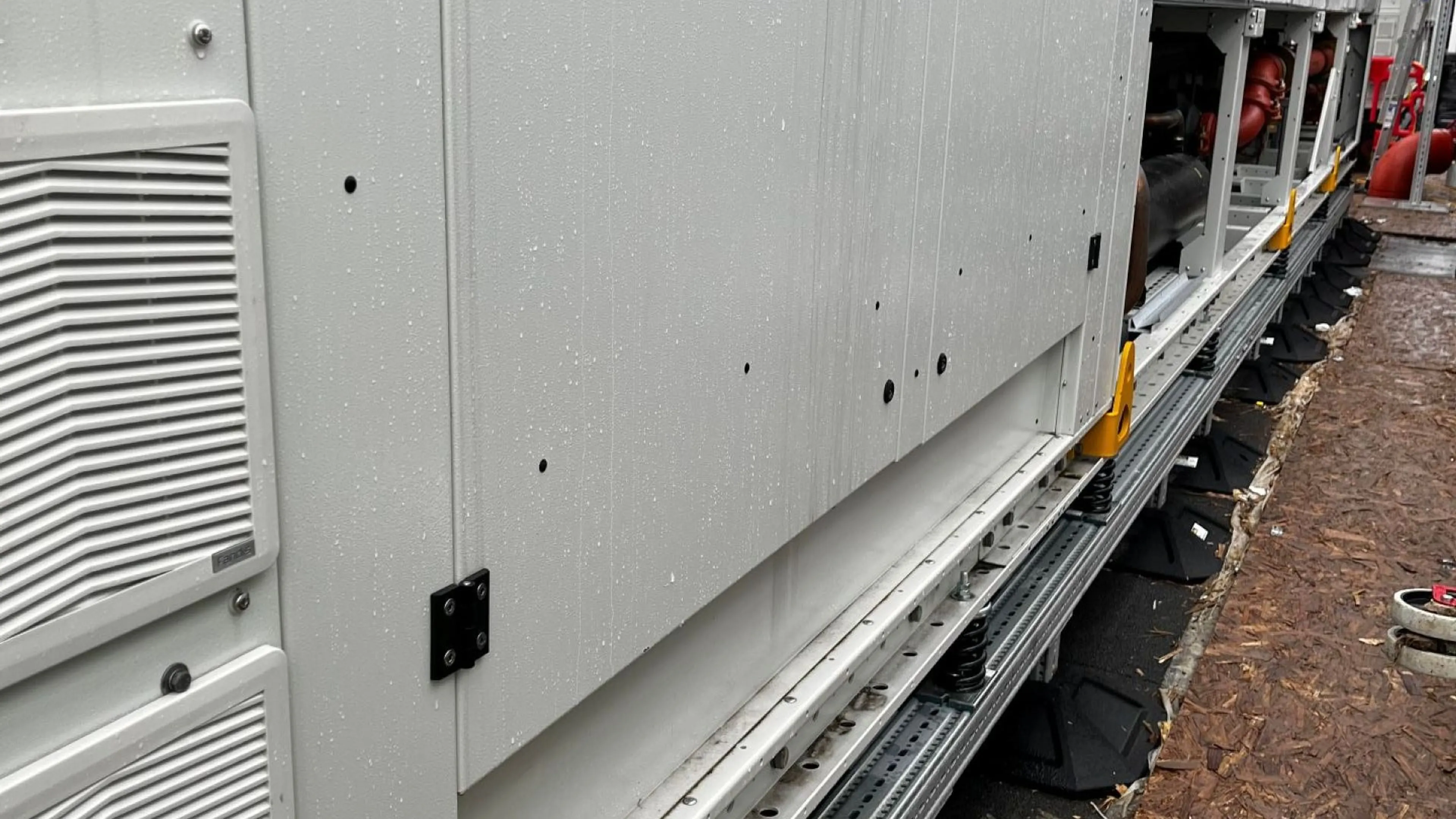 Large Sikla siFramo HVAC support installed onsite with anti-vibration springs and non penetrative black rubber feet