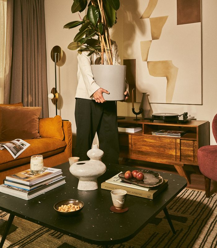 Person holding plan in lounge