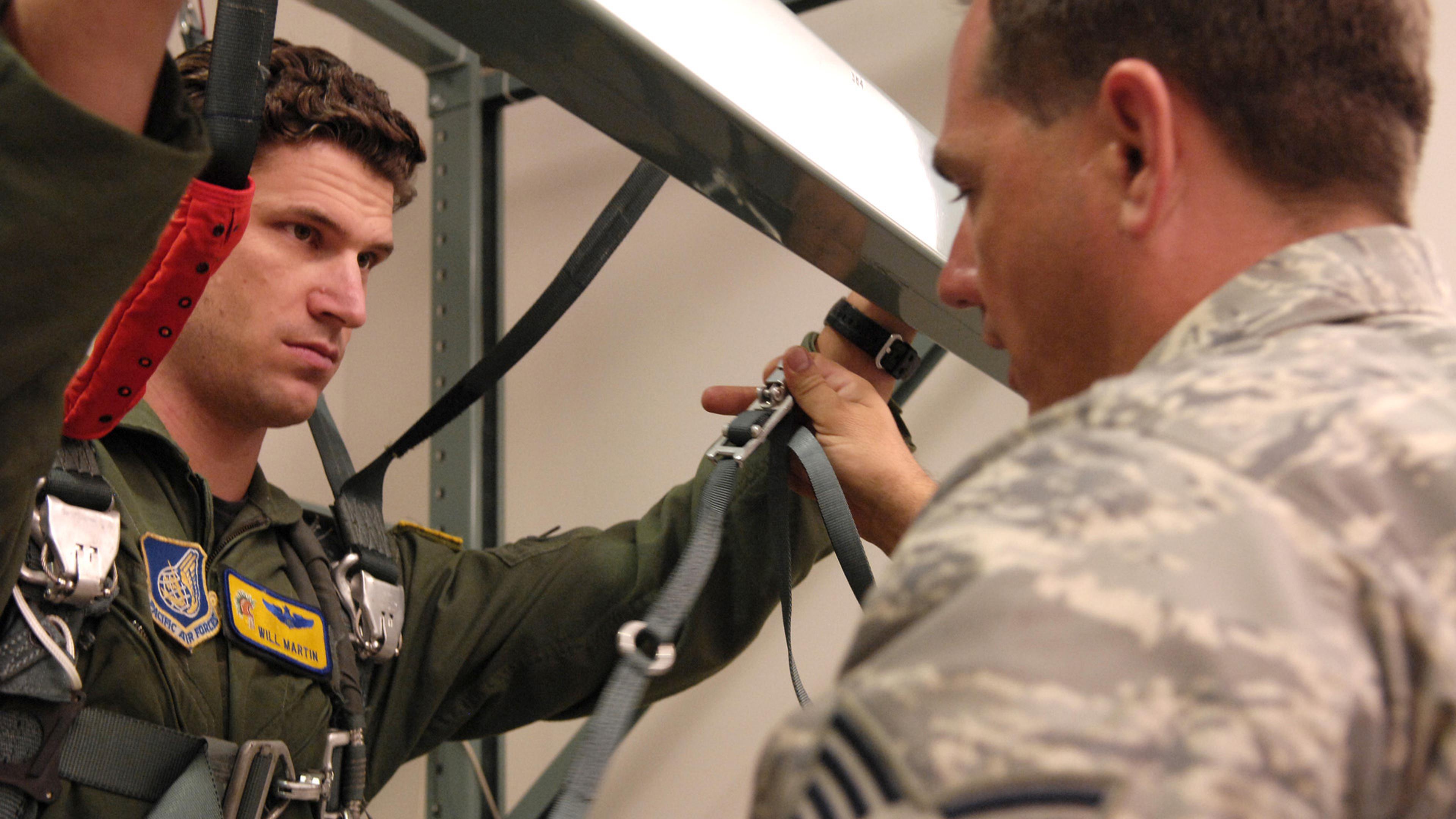 Pilot in a parachute harness during PARASIM® ejection survival training