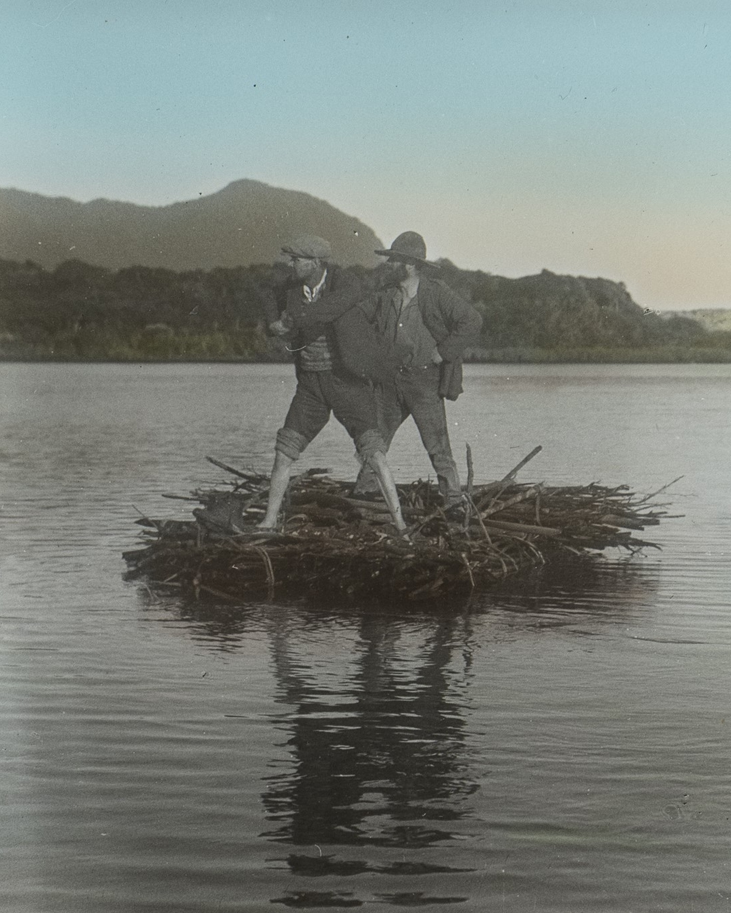 A raft made from a bathtub and flax sticks was used to cross the Hollyford River estuary. Canterbury Museum 20233924