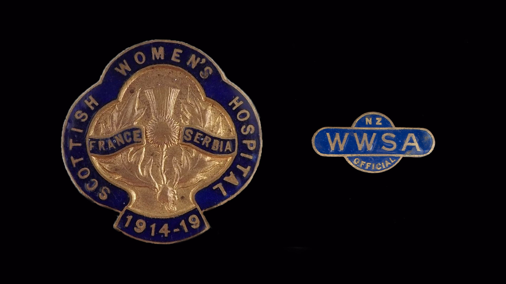 Scott's Scottish Women’s Hospitals for Foreign Service lapel badge (National Army Museum 2018.173.41) and a badge for the New Zealand Women's War Service Auxiliary (Canterbury Museum 1991.328.14).