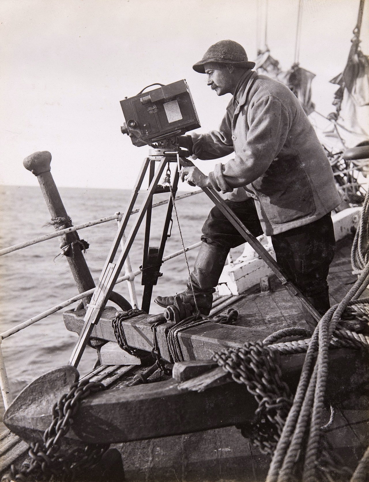 Herbert Ponting filming whales from the deck of the Terra Nova during the British Antarctic Expedition 1910-1913.Canterbury Museum 1975.289.79