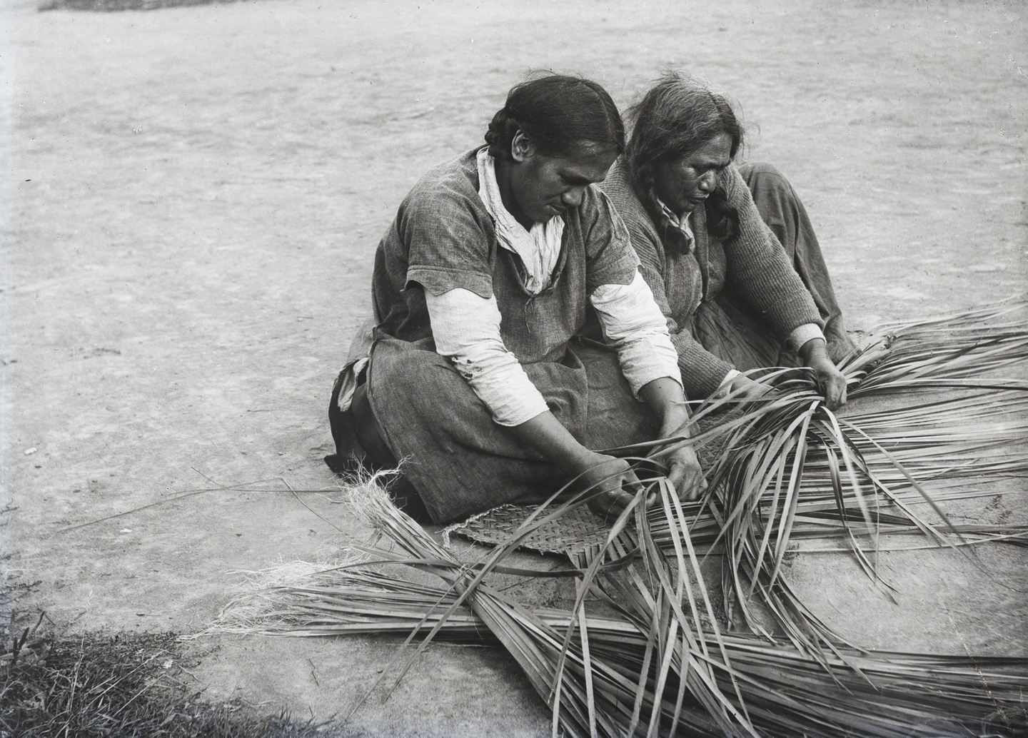 Two women weaving flax. Canterbury Museum 1940.193.80