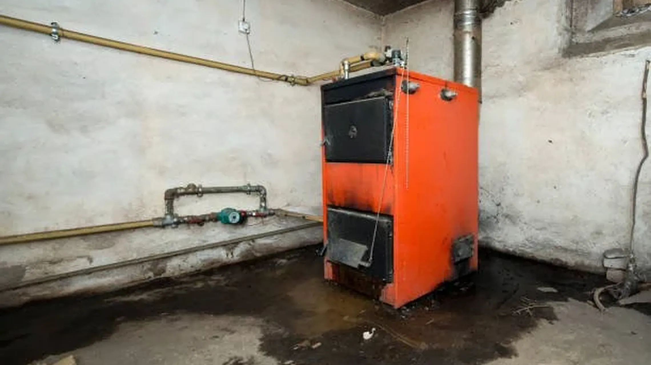 An old furnace in a basement