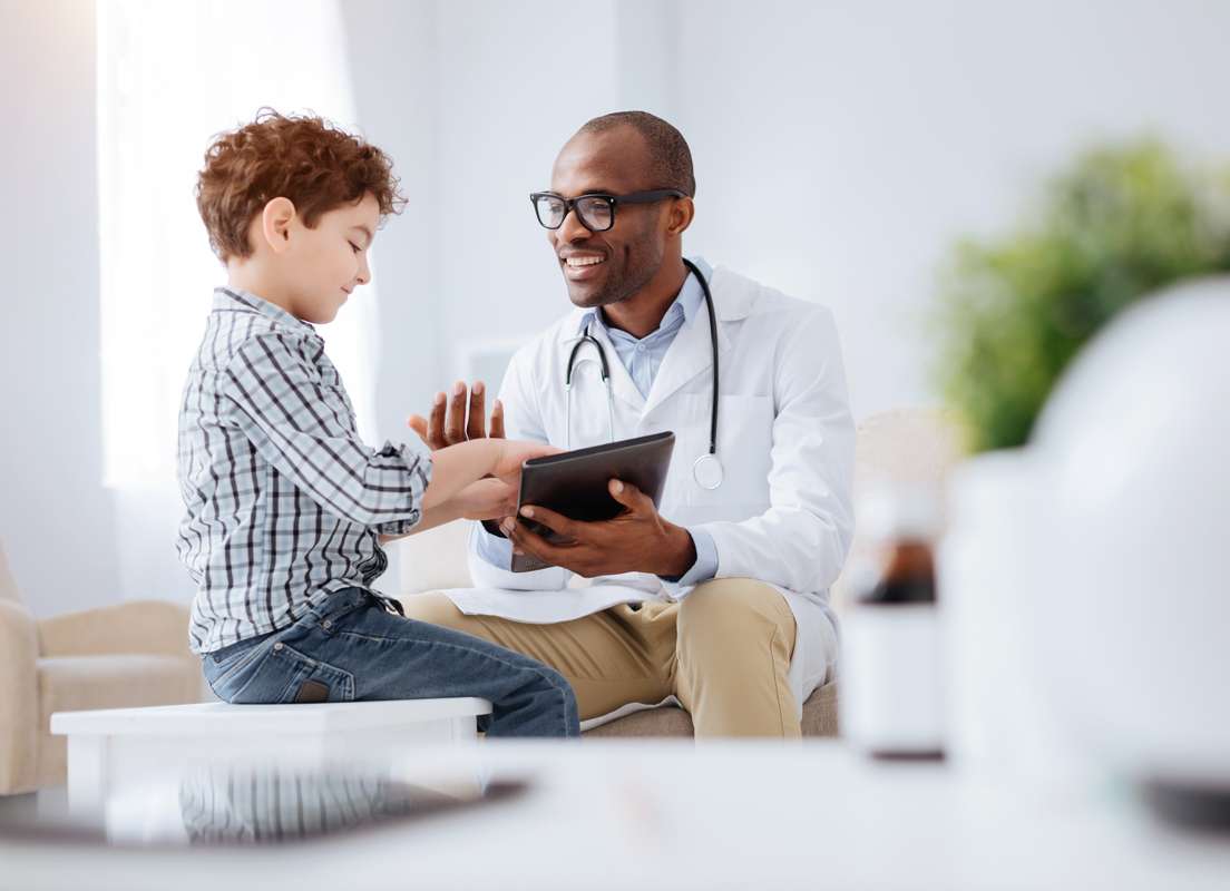 Doctor with a young patient