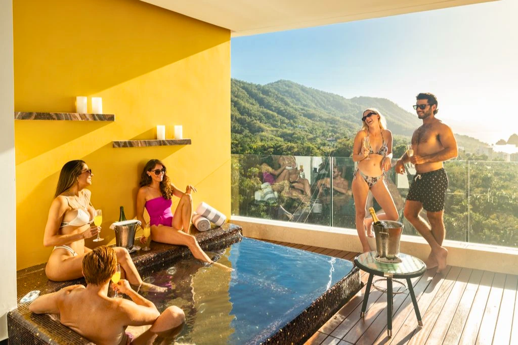 group of friends getting along at the terrace of a suite