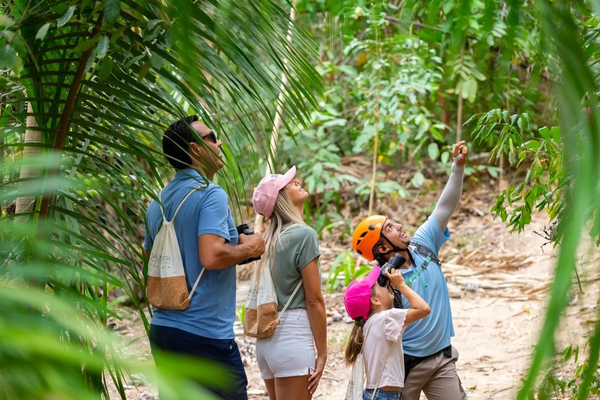 family doing hiking wiht a tour guide