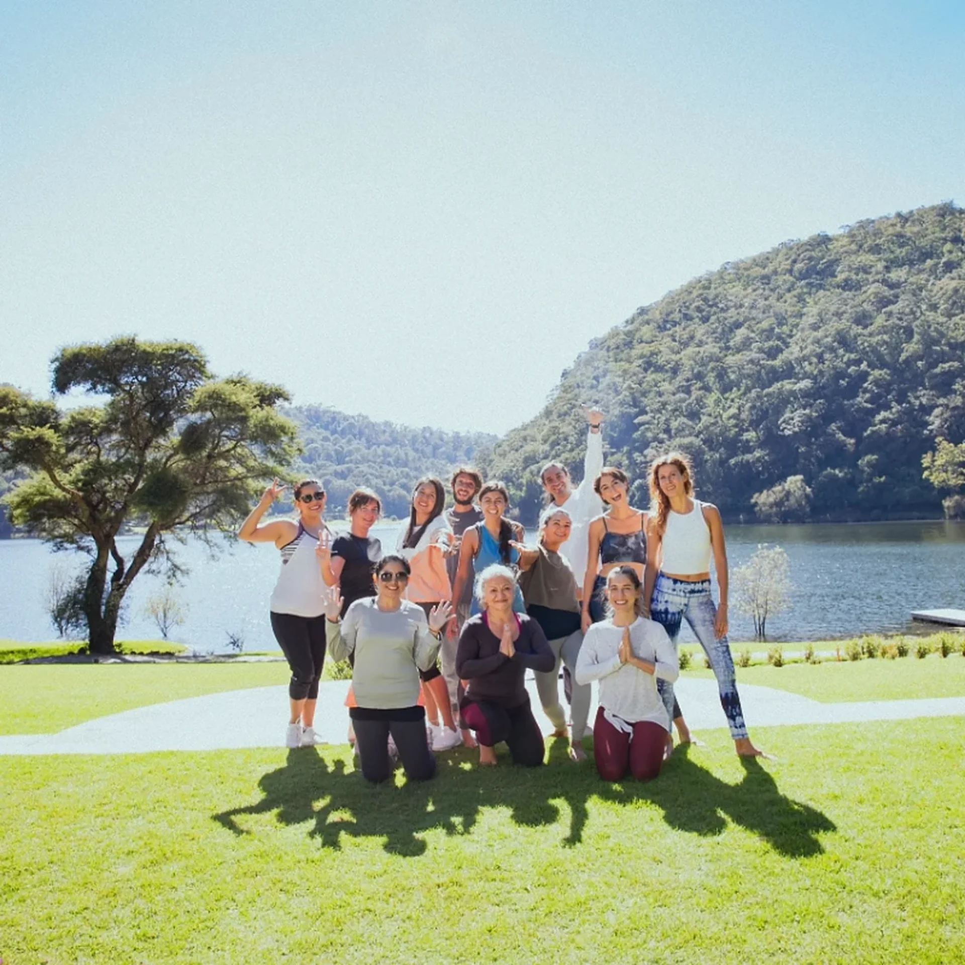 Group of friends celebrating on the lawn by Juanacatlán Lake at Sierra Lago