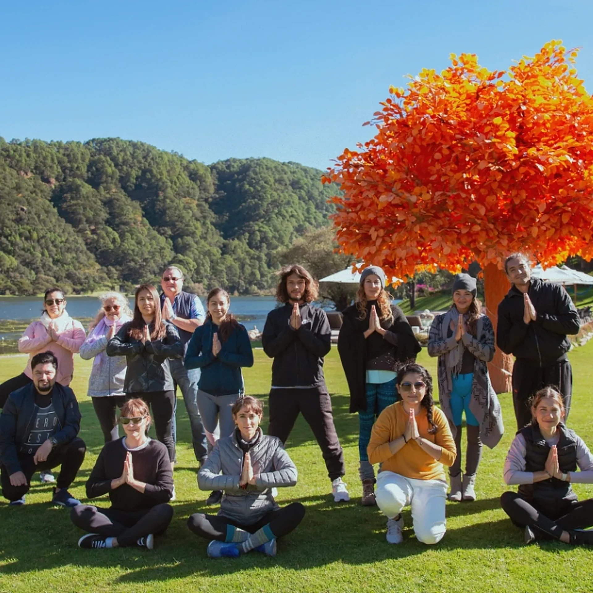 Group meditation session on the lawn at Sierra Lago