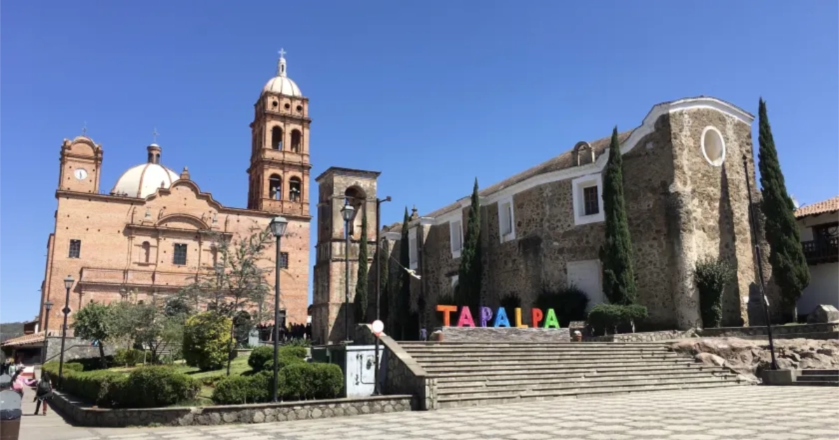 Tapalpa main square with stone churches and colorful town letters