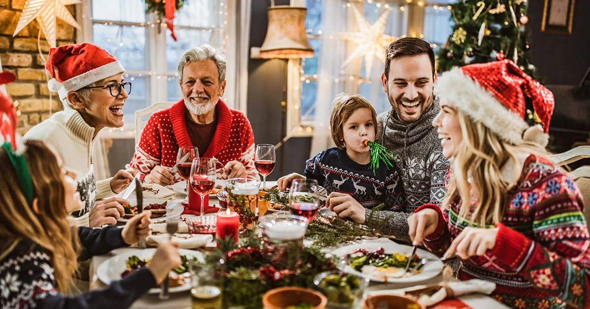 Family cooking a homemade New Year's Eve dinner together