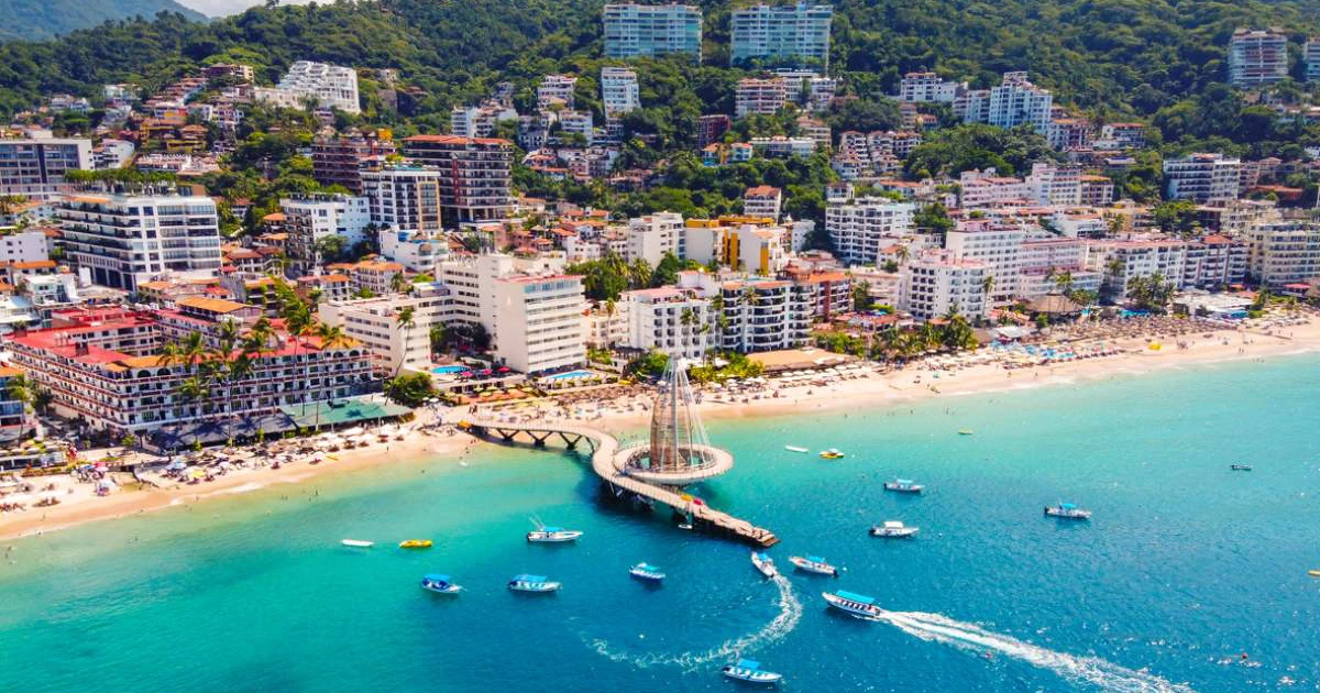 Aerial view of the Puerto Vallarta bay and pier along the beach