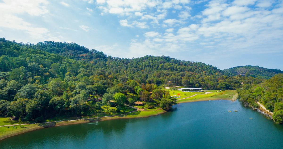 Aerial view of the lake and forest at Sierra Lago Resort & Spa in Mascota