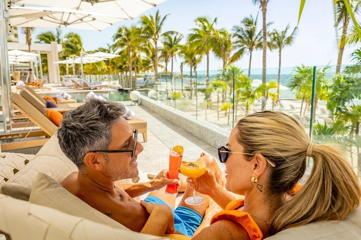 couple drinking premium cocktails