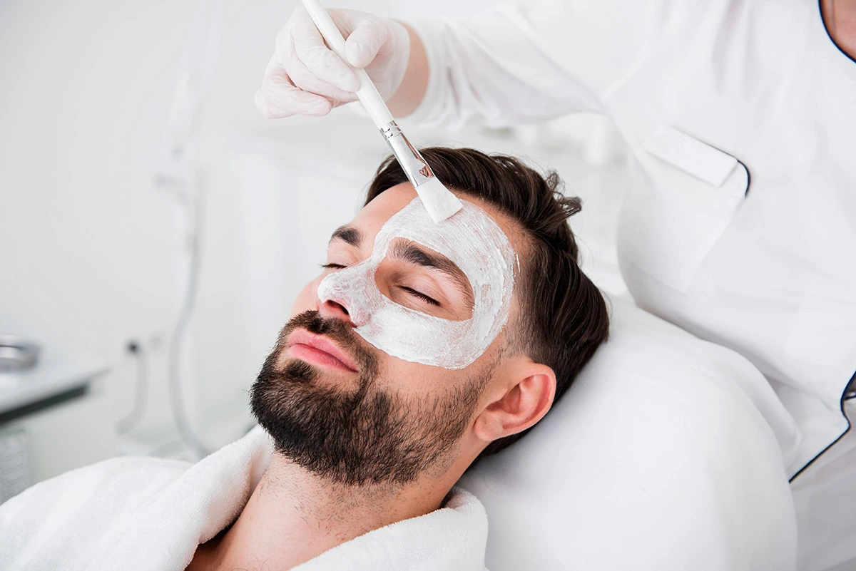 man experience a facial