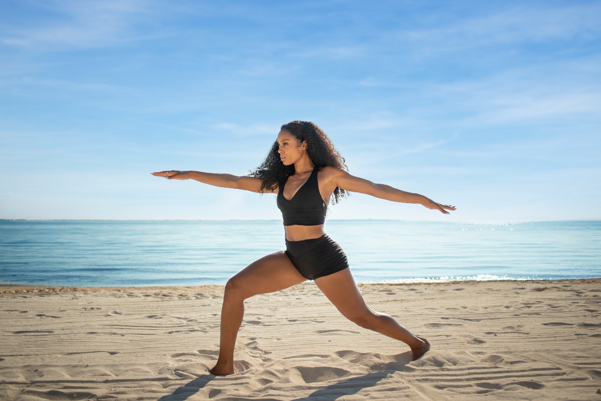girl-practicing-yoga-at-garza-blanca-cancun-beach