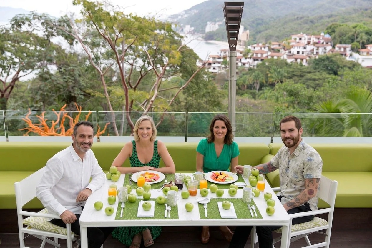 2 couples having breakfast in the rooftop