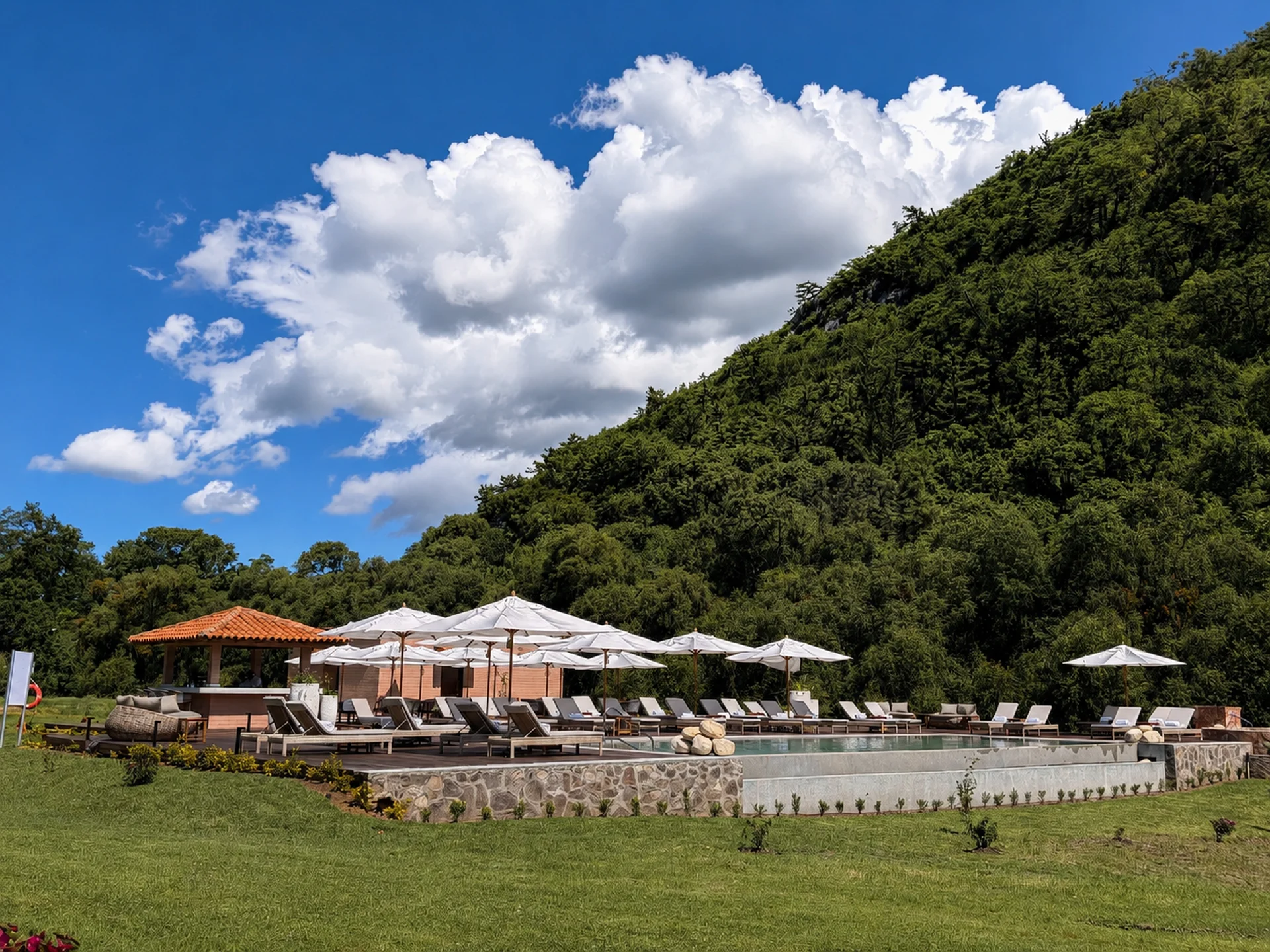 Sierra Lago Resort & Spa - Heated adults-only pool with loungers and umbrellas under a blue sky