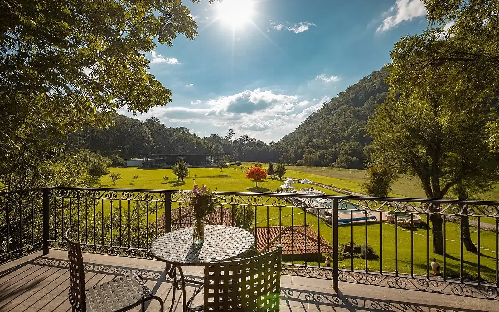 Cabin terrace overlooking the gardens and mountains