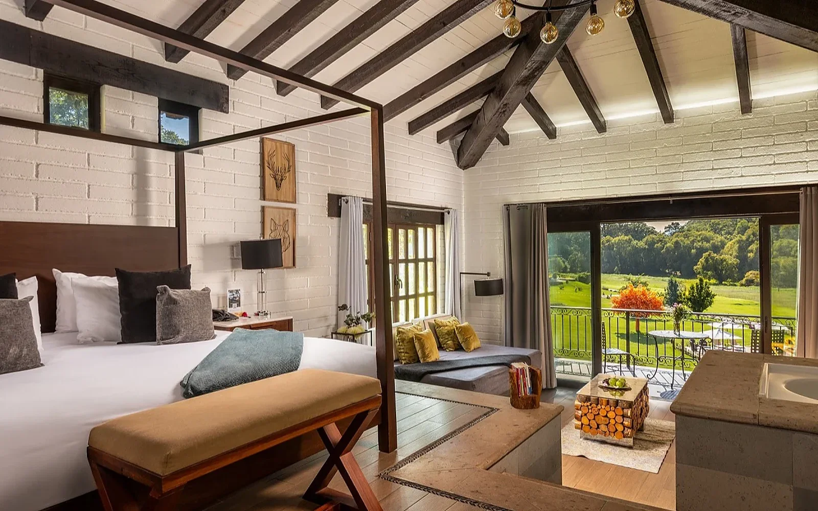 Cabin bedroom with a king bed and forest views