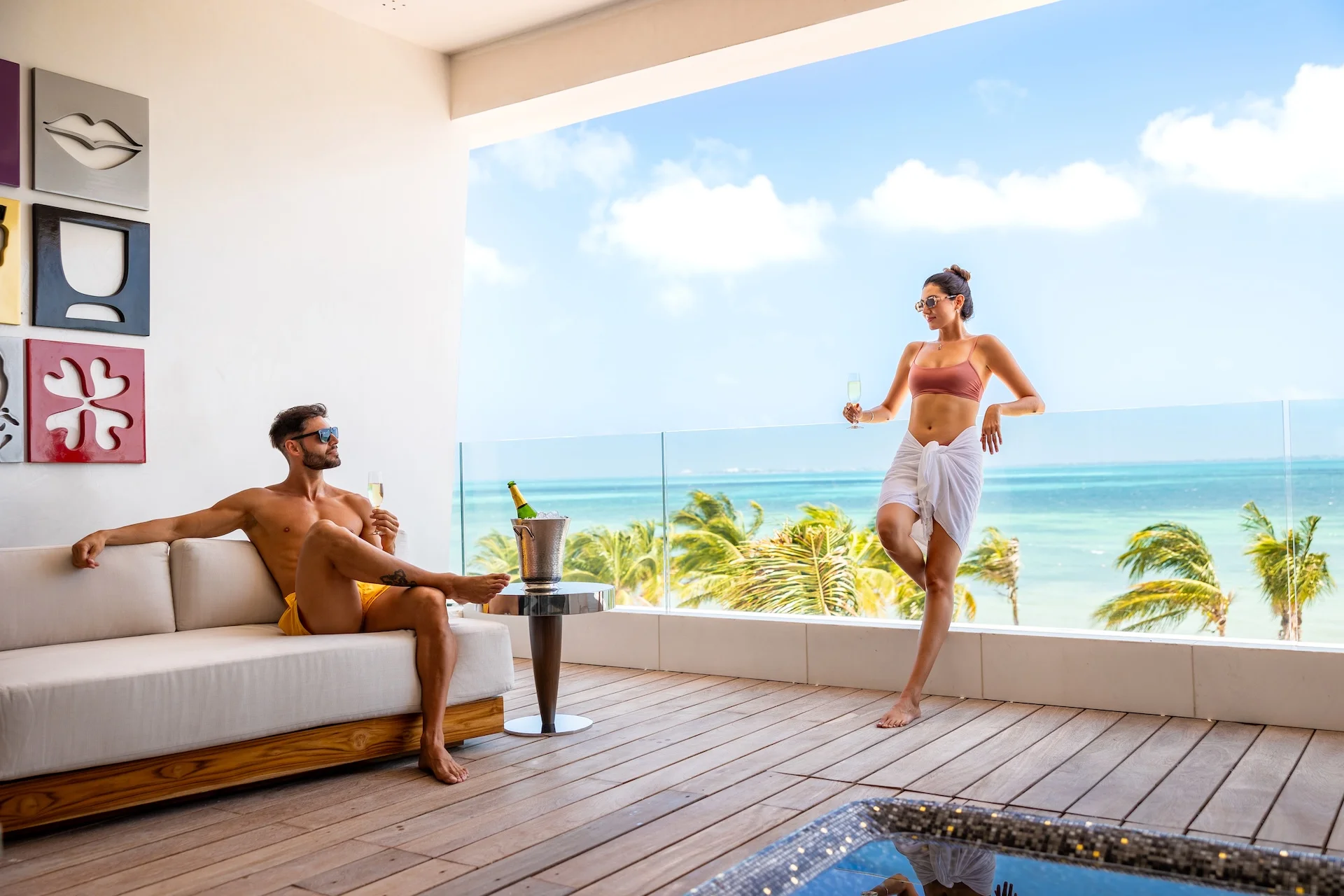Private suite terrace with outdoor Jacuzzi and Caribbean views at Hotel Mousai Cancun