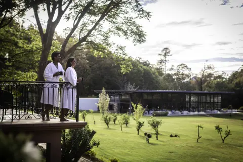 Sierra Lago Resort & Spa - Couple in spa robes on a balcony overlooking the gardens