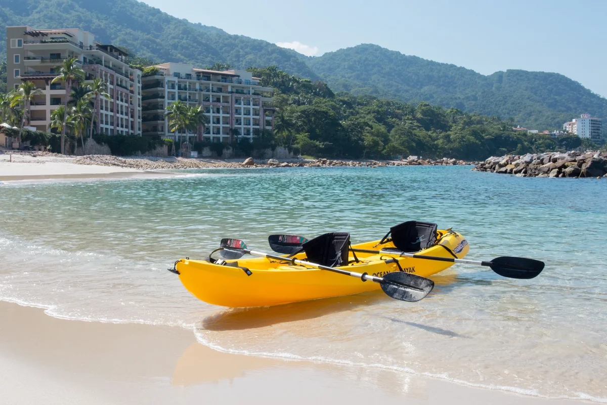 Yellow double kayak on the sand at Garza Blanca Puerto Vallarta