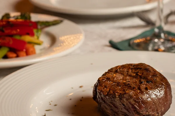 Sierra Lago Resort & Spa - Vertical view of a grilled beef fillet on a white plate
