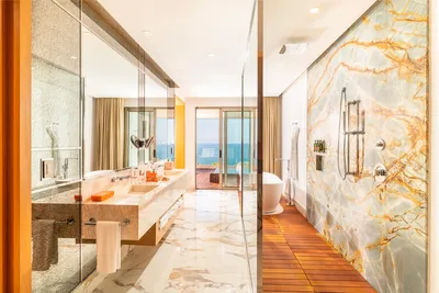 Junior Suite at Garza Blanca Sanctuary with a king bed, ocean views and a private terrace in Puerto Vallarta.