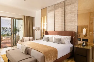 Corner Suite at Garza Blanca Sanctuary with panoramic ocean views, floor-to-ceiling windows and a spacious terrace in Puerto Vallarta.