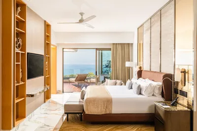 Junior Suite at Garza Blanca Sanctuary with a king bed, ocean views and a private terrace in Puerto Vallarta.